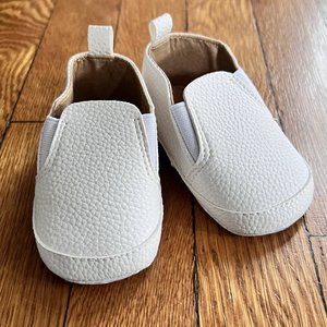 White slip-on sneakers